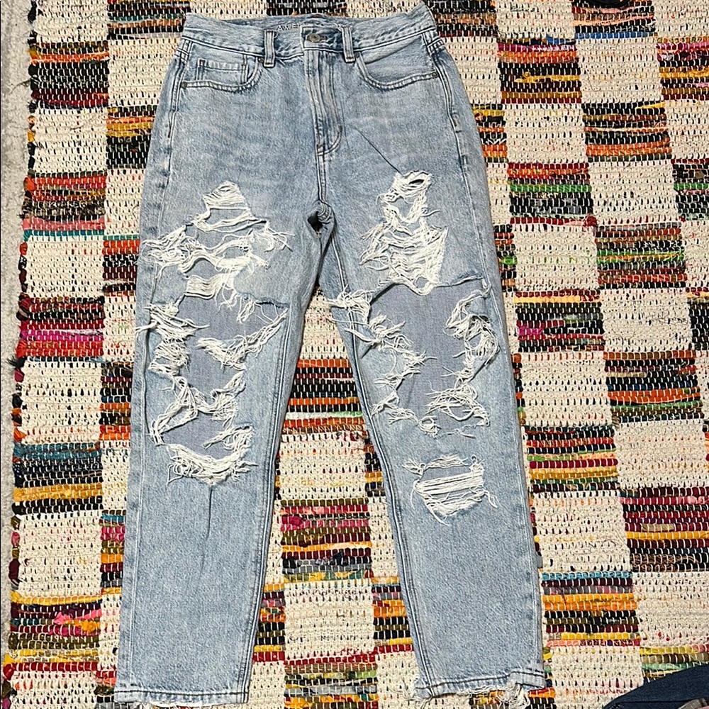 Light wash high waisted distressed mom jeans